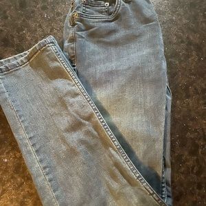 Light Blue Denim Jeans with Faded Texture and Contrast Stitching